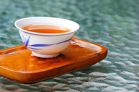 茶海一杯茶文化饮料宏观传统陶器过山车黄色绿色飞碟杯子背景