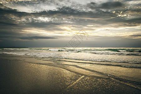 Broome 澳大利亚日落海滩海浪泡沫平衡旅行阴影沙漠海洋天空石头图片