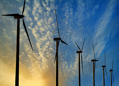 日落时的涡轮发电机天空生态植物力量风车太阳活力环境日出图片