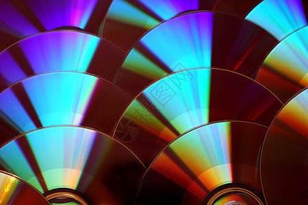 CD 和 dvd 背景数字化字节反射商业光谱电脑磁盘技术圆形光学图片