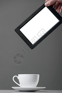 白杯和平板电脑机动性电话咖啡店笔记咖啡商业技术药片互联网展示图片