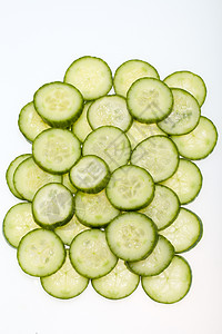 白色背景上孤立的新鲜切片黄瓜福利温泉食物果皮营养蔬菜水果活动身体皮肤图片