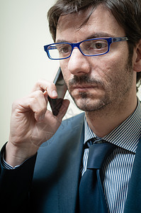 打电话的商务人士商务管理人员公司手机讲话办公室工作老板经理成人图片