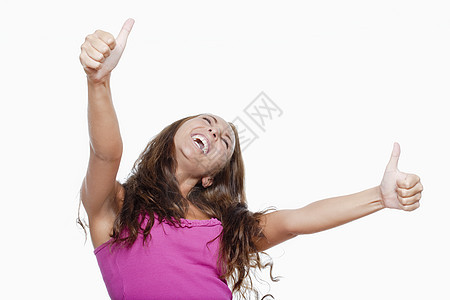 女孩举起拇指学生微笑工作室白色喜悦协议尖叫女士女性快乐图片