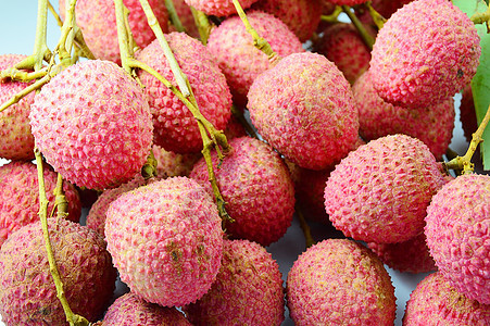 紧闭新鲜的柳叶果实水果红色食物团体热带甜点荔枝粉色图片