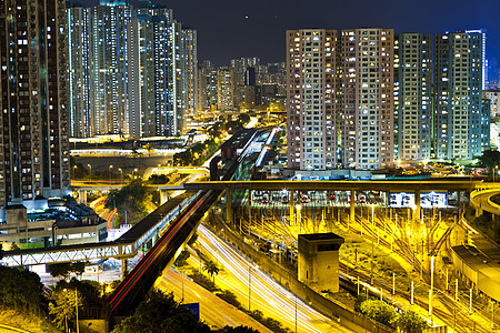 晚上在香港辉光天空日落公共汽车运动运输街道汽车地标摩天大楼图片