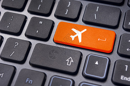 在线订机票 键盘上标有飞机标志飞行旅行钥匙空气纽扣手续按钮商业运输互联网图片
