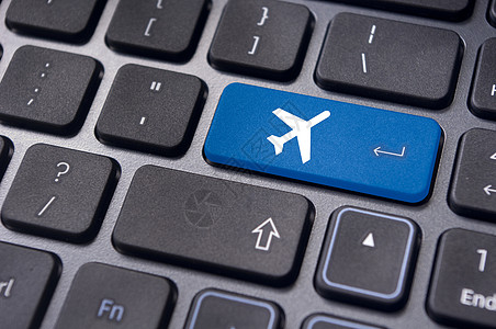 在线订机票 键盘上标有飞机标志纽扣交通工具商业互联网客票旅行运输手续空气电子图片
