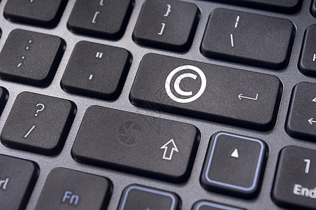 键盘上带有符号的版权概念网站专利保护商业法律财产注意事项商标知识分子图片