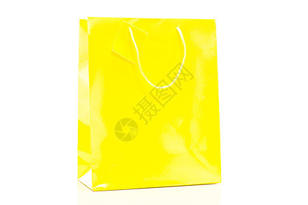 白色背景的单黄色购物袋(白底面)图片