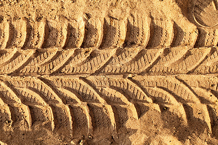 沙尘路上的轮轮痕迹灰尘旅行土地运输地面踪迹交通烙印地形驾驶图片