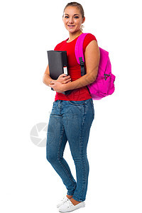 带着粉色背包的漂亮大学生工作室女孩女士牛仔裤肩膀女性冒充快乐学生学习图片