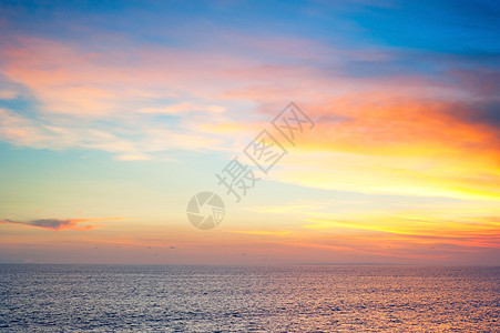 巴厘日落金子海洋海滩波浪假期天空热带旅行太阳蓝色图片