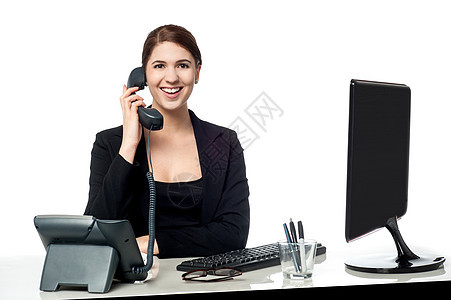 女秘书接听电话的女秘书技术商务职业管理人员雇主助手椅子桌子办公室女性图片