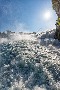 在瑞士莱茵瀑布附近力量流动泡沫溪流太阳瀑布压力强光沸腾薄雾图片
