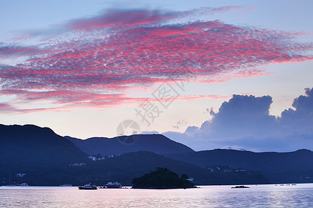 日出时有海橙子场景海岸天气海洋阳光金子海浪反射晴天图片