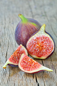 清新无花果肉质蔬菜水果木头团体紫色白色种子绿色食物图片