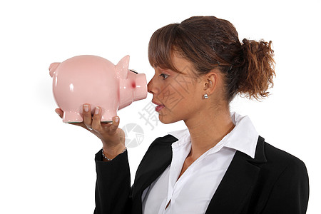 拥有猪银行的女商务人士快乐存储金融安全公司店铺投资商务基金账单图片