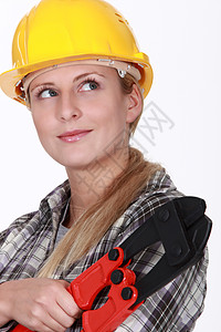 女人和一对螺栓剪刀工人建设者工作室女孩白色女士安全牛仔裤女性收割机图片
