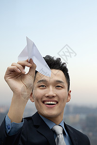 商务员飞行纸飞机运动摄影微笑愿望手势成功投掷童年套装人士图片