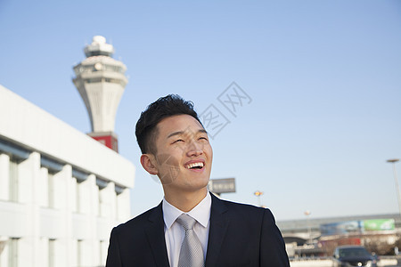 旅行者看机场的天空人士奢华摄影阶层商务道路自由旅行衣冠收腰图片
