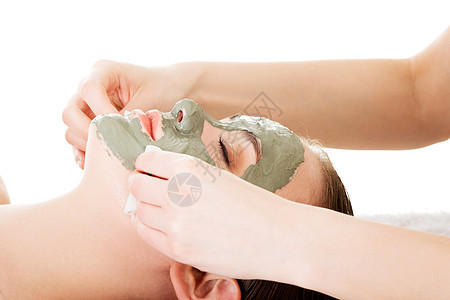 疗养院的美容治疗 有面部粘土面具的女人卫生福利黏土身体女士护理女孩水疗美容师奢华图片