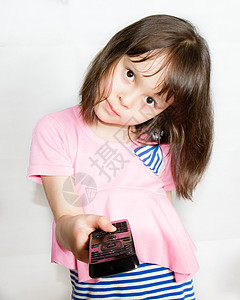 具有遥控的亚洲儿童女性微笑视频控制单元喜悦技术孩子们键盘孩子图片