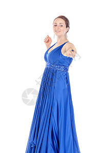 一个穿蓝裙子的年轻美女的肖像 露出他的喜悦快乐女性成人蓝色女孩黑发图片