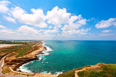 海景石头蓝色热带岩石沥青海滩旅游爬坡天空边界图片