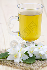 茉菊茶和茉莉花草本植物早餐玻璃餐具花瓣植物叶子药品饮料杯子图片