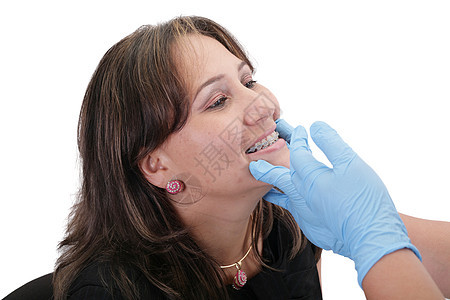 女性病人看牙医治疗的女病人图片