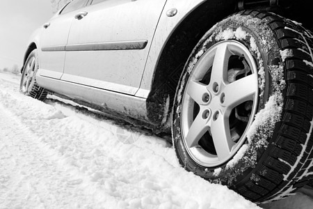冬季轮胎冻结痕迹安全车轮街道驾驶车辆交通踪迹雪花图片