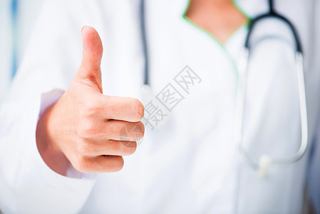 举起拇指的医生成人微笑手指男人医疗工作白色女性手势药品图片