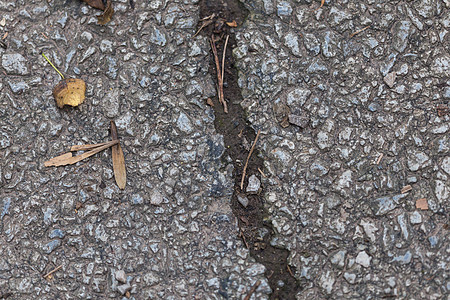 人行道沥青损害黄色宏观道路差距地面街道裂缝车道图片