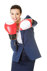 带拳手套的年轻女商务人士成人拳击工作室套装红色秘书眼睛工人人士商务图片