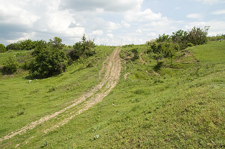 通往地平线的道路蓝色草原国家水坑农村森林土地草地牧场天堂图片