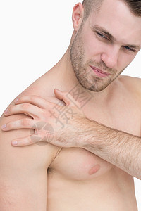 将肩部疼痛的无衬衣男子关上男性按摩肌肉保健胸部膀子肩膀压力痛苦男人图片