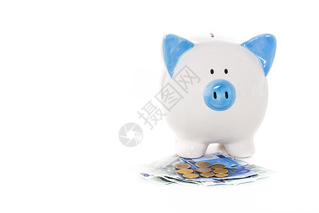 蓝白小猪银行 持有欧元纸币和硬币图片