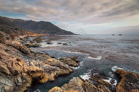 加拉帕塔州海滩海浪支撑海洋海湾旅游日落岩石公园崎岖蓝色图片