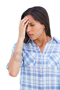 头痛和额头上有手的女人焦虑格纹长发黑发衬衫女士女性前额压力痛苦图片