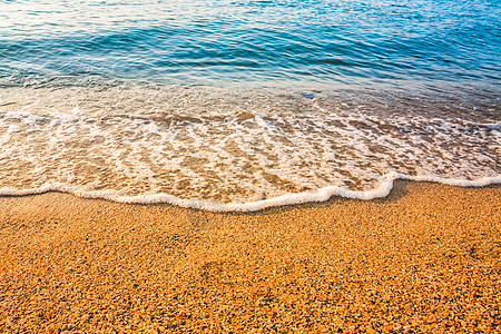 沙滩和海浪支撑液体海片海岸流动海洋阳光海岸线海景反射图片