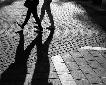 街上人行走的影子阴影太阳城市旅行点燃生活场景背光民众街道图片