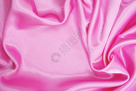 平滑优雅的粉色丝绸作为背景纺织品海浪婚礼织物布料材料曲线投标薰衣草背景图片