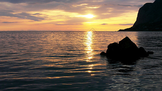 日落海洋蓝色支撑海景海浪海岸线岩石海岸石头天气图片