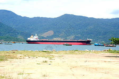圣塞巴斯蒂亚港热带运输船运进口拉丁油船贸易出口海洋森林图片