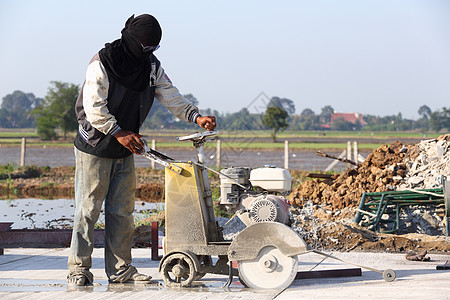 具体联合削减建筑钻石工人工具男人劳动街道水泥职场灰尘图片