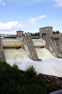 伊马特拉水力发电站大坝的漏水水电建筑学天空水坝岩石溢洪道瀑布地标发电机石头图片