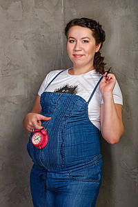 未来的母亲生育力女性产妇工作室身体小猫微笑娃娃腹部女士图片