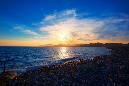 伊比扎法尔科角海滩日落Es Vedra在圣何塞地平线猎鹰橙子石头假期海洋滚动旅行反射海岸图片