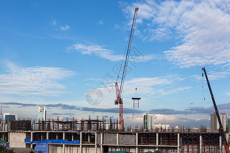 有起重机工人和建筑物的建筑工地财产办公室建造工程公寓水泥窗户进步项目两极图片